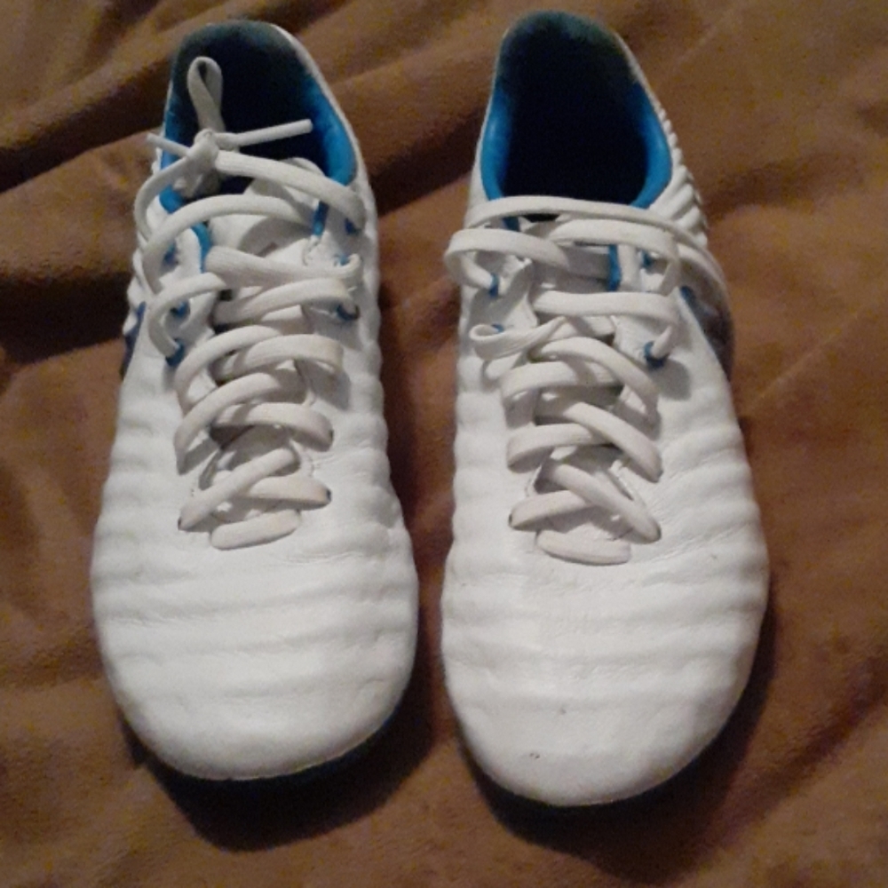 White and blue cleats